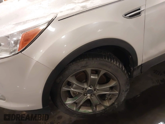 2013 Ford Escape SEL with VIN 1FMCU9HX0DUD85206, listed as a IAAI auction lot 41623110 with 99,223 mi miles. Bid and sale history available at carsss.com. Image 6.