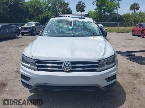 2018 Volkswagen Tiguan SEL with VIN 3VV3B7AX4JM201878, listed as a IAAI auction lot 42083809 with 115,956 mi miles and . Bid and sale history available at DreamBid. Image 13.