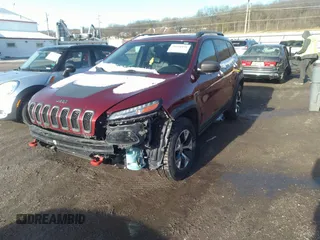 2014 Jeep Cherokee Trailhawk with VIN 1C4PJMBS9EW161047, listed as a IAAI auction lot 41841038 with Not Provided miles. Bid and sale history available at carsss.com. Image 2.
