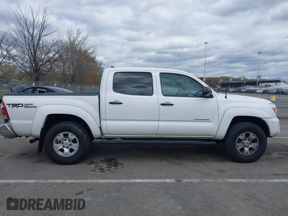 2015 Toyota Tacoma with VIN 5TFLU4EN6FX120947, listed as a IAAI auction lot 42043239 with 125,480 mi miles and . Bid and sale history available at DreamBid. Image 13.