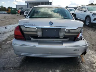 2009 Mercury Grand Marquis LS with VIN 2MEHM75V99X612456, listed as a Copart auction lot 71787204 with 250,888 mi miles and Salvage Title. Bid and sale history available at carsss.com. Image 6.