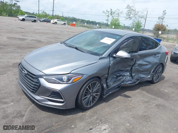 2018 Hyundai Elantra Sport with VIN KMHD04LB0JU597002, listed as a IAAI auction lot 41983087 with 95,583 mi miles. Bid and sale history available at carsss.com. Image 2.