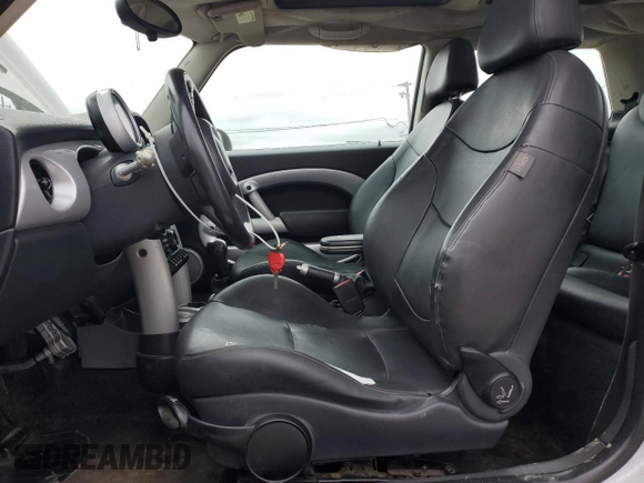 2005 MINI Hardtop with VIN WMWRC335X5TJ70165, listed as a Copart auction lot 53918445 with 145,572 mi miles and Salvage title. Bid and sale history available at DreamBid. Image 7.