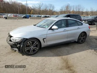 2016 BMW 4 Series 428i with VIN WBA4A9C5XGGL88718, listed as a Copart auction lot 74292714 with 123,185 mi miles and Salvage Title. Bid and sale history available at carsss.com. Image 1.