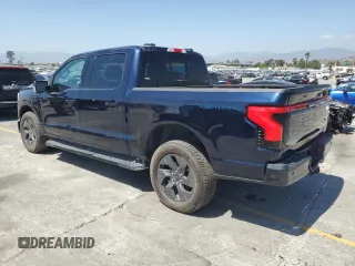 2022 Ford F-150 Lightning Pro z VIN 1FT6W1EV8NWG04113, wystawiony jako Copart lot #57489635 z przebiegiem 48 990 mil mil oraz Szkody całkowita. Historia ofert i sprzedaży dostępna na DreamBid. Obrazek 2.