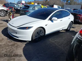 2025 Tesla Model 3 Long Range with VIN 5YJ3E1EB4SF914979, listed as a IAAI auction lot 41695023 with 2,263 mi miles and . Bid and sale history available at DreamBid. Image 16.