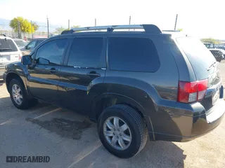 2011 Mitsubishi Endeavor LS with VIN 4A4JN2AS2BE012845, listed as a IAAI auction lot 41965619 with 195,521 mi miles. Bid and sale history available at carsss.com. Image 3.