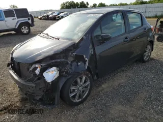 2012 Toyota Yaris L with VIN JTDKTUD32CD505384, listed as a Copart auction lot 52215485 with 136,069 mi miles and Salvage Title. Bid and sale history available at carsss.com. Image 1.