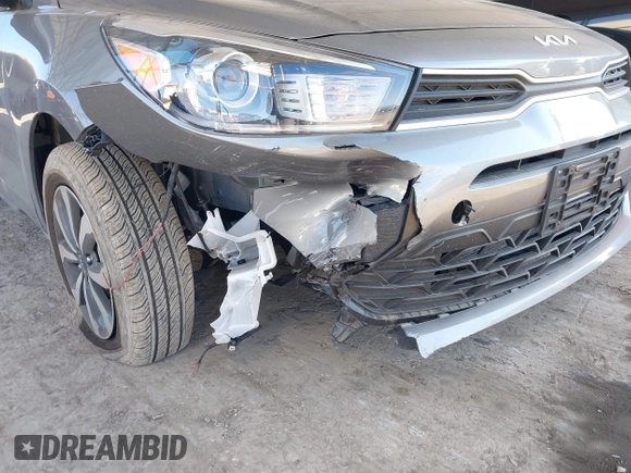 2023 Kia Rio S z VIN 3KPA24AD1PE579816, wystawiony jako IAAI lot #41349202 z przebiegiem 5784 mil mil oraz . Historia ofert i sprzedaży dostępna na DreamBid. Obrazek 6.