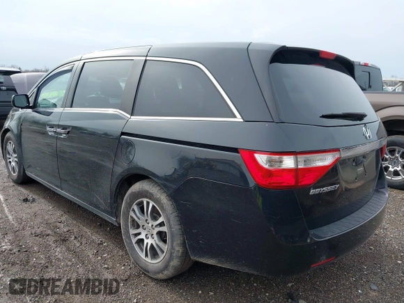 2012 Honda Odyssey EX with VIN 5FNRL5H46CB096547, listed as a IAAI auction lot 41919700 with 165,882 mi miles and . Bid and sale history available at carsss.com. Image 3.