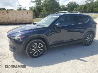 2018 Mazda CX-5 Touring with VIN JM3KFACM5J0419207, listed as a Copart auction lot 51123855 with 75,831 mi miles and Salvage Title. Bid and sale history available at carsss.com. Image 1.