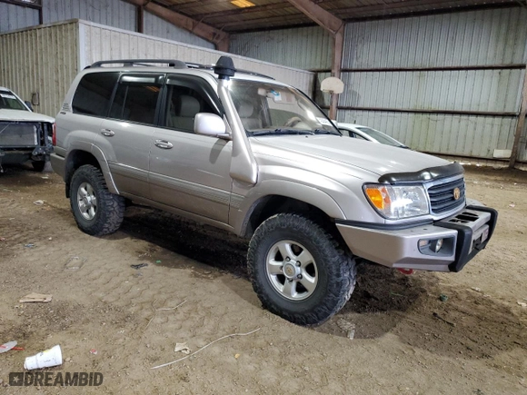 1999 Toyota Land Cruiser with VIN JT3HT05J2X0049288, listed as a Copart auction lot 42304455 with 255,285 mi miles and Salvage Title. Bid and sale history available at carsss.com. Image 4.