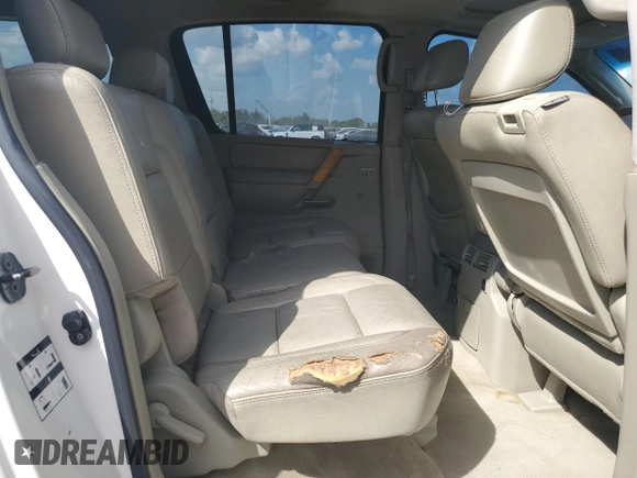 2007 Infiniti QX56 z VIN 5N3AA08C17N802573, wystawiony jako Copart lot #47557175 z przebiegiem 263 078 mil mil oraz Szkoda całkowita • Salvage title. Historia ofert i sprzedaży dostępna na DreamBid. Obrazek 11.