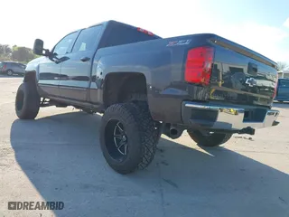 2015 Chevrolet Silverado 1500 LT with VIN 3GCUKREC0FG504717, listed as a IAAI auction lot 41668156 with 79,641 mi miles. Bid and sale history available at carsss.com. Image 3.
