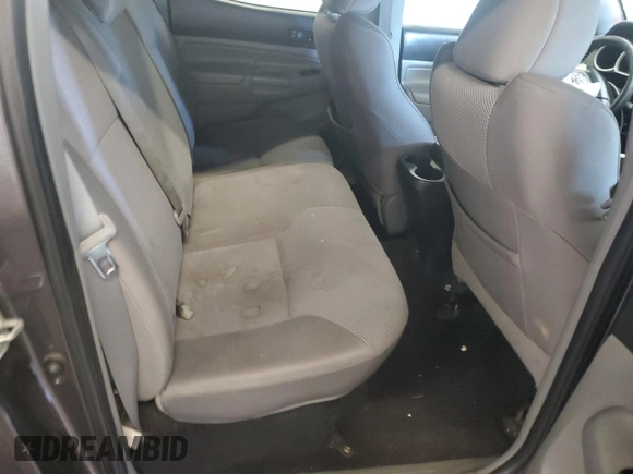 2013 Toyota Tacoma z VIN 5TFLU4ENXDX061110, wystawiony jako Copart lot #58910865 z przebiegiem Nie podano mil oraz Szkoda całkowita • Salvage title. Historia ofert i sprzedaży dostępna na DreamBid. Obrazek 10.