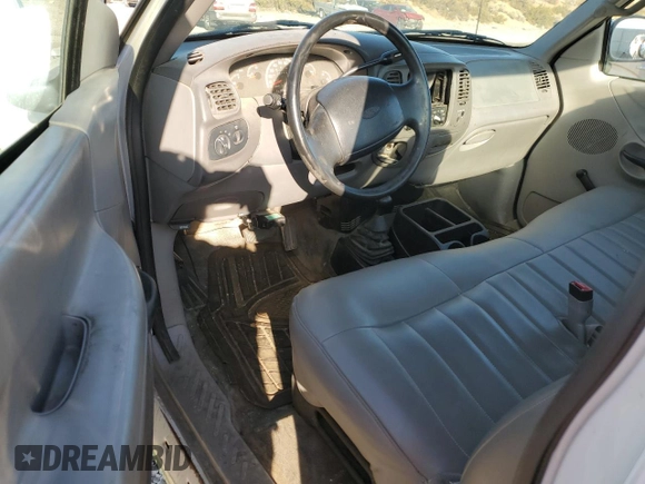 1998 Ford F-150 with VIN 1FTZF1821WKB21778, listed as a Copart auction lot 73009444 with 220,898 mi miles and Salvage title. Bid and sale history available at DreamBid. Image 8.