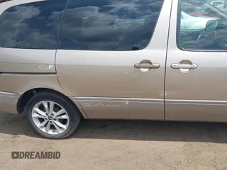 2001 Toyota Sienna LE with VIN 4T3ZF13C01U325889, listed as a IAAI auction lot 42795570 with 211,585 mi miles and . Bid and sale history available at DreamBid. Image 6.