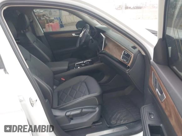 2024 Volkswagen Atlas SE with VIN 1V2HR2CA2RC604880, listed as a IAAI auction lot 42134511 with 11,993 mi miles and . Bid and sale history available at DreamBid. Image 5.