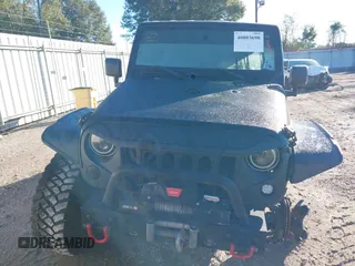 2008 Jeep Wrangler Unlimited X с VIN 1J4GA39178L652983, выставлен на аукционе IAAI как лот 40803698 с пробегом 114 012 миль миль и . История ставок и продаж доступна на DreamBid. Изображение 13.