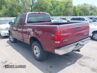 1998 Ford F-150 with VIN 1FTZX18W9WKC09638, listed as a IAAI auction lot 42576838 with 140,714 mi miles and . Bid and sale history available at DreamBid. Image 3.