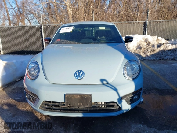 2014 Volkswagen Beetle Turbo R-Line with VIN 3VWVT7AT9EM661347, listed as a IAAI auction lot 41336295 with 61,068 mi miles and . Bid and sale history available at DreamBid. Image 12.
