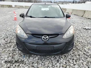 2011 Mazda 2 Touring z VIN JM1DE1HY2B0114734, wystawiony jako Copart lot #86430934 z przebiegiem 123 265 mil mil oraz Czysty tytuł • Clean title. Historia ofert i sprzedaży dostępna na DreamBid. Obrazek 5.