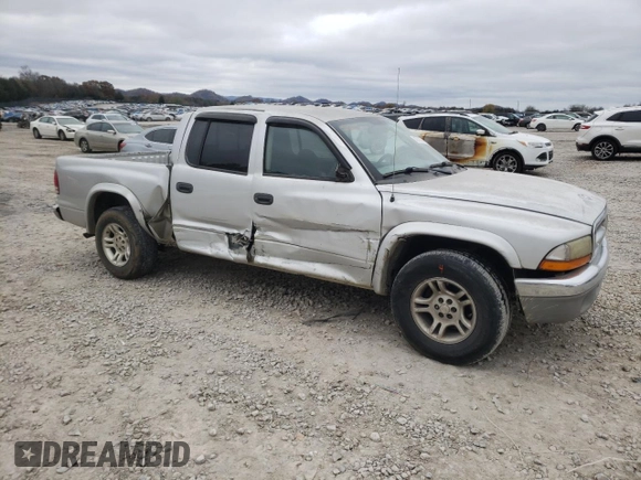 2003 Dodge Dakota SLT with VIN 1D7HL48X13S151334, listed as a Copart auction lot 82016764 with 216,281 mi miles and Salvage Title. Bid and sale history available at carsss.com. Image 4.