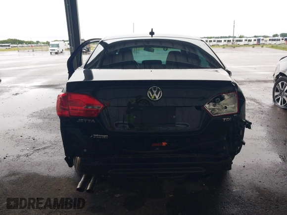 2012 Volkswagen Jetta TDI w/Premium & Nav with VIN 3VWLL7AJ8CM326549, listed as a IAAI auction lot 42748170 with 200,385 mi miles and . Bid and sale history available at DreamBid. Image 17.