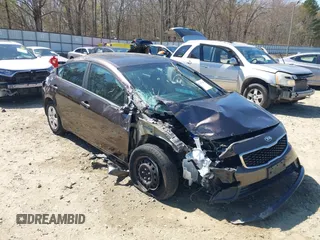 2018 Kia Forte LX with VIN 3KPFL4A71JE201144, listed as a IAAI auction lot 41874778 with 100,980 mi miles. Bid and sale history available at carsss.com. Image 6.