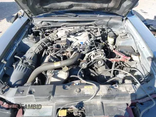 2001 Ford Mustang Standard with VIN 1FAFP40461F264327, listed as a IAAI auction lot 42002990 with 316,107 mi miles. Bid and sale history available at carsss.com. Image 10.