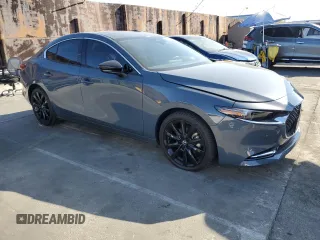 2023 Mazda 3 Premium Plus with VIN 3MZBPBEY5PM374977, listed as a Copart auction lot 70642804 with 9,029 mi miles and Salvage Title. Bid and sale history available at DreamBid. Image 4.