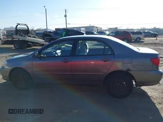 2004 Toyota Corolla CE with VIN 1NXBR38EX4Z265969, listed as a IAAI auction lot 41948986 with 235,816 mi miles. Bid and sale history available at carsss.com. Image 14.
