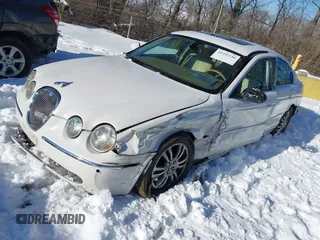 2005 Jaguar S-Type with VIN SAJWA01T75FN17656, listed as a IAAI auction lot 41282140 with 126,631 mi miles and . Bid and sale history available at DreamBid. Image 2.