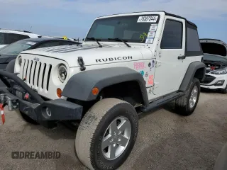 2009 Jeep Wrangler Rubicon with VIN 1J4GA64149L707142, listed as a Copart auction lot 76387344 with Not Provided miles and Salvage Title. Bid and sale history available at DreamBid. Image 1.