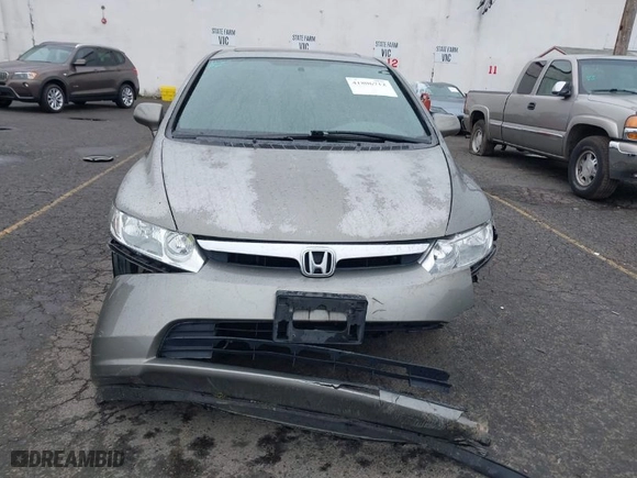 2006 Honda Civic Sdn EX with VIN 2HGFA16806H515306, listed as a IAAI auction lot 41806712 with 148,315 mi miles. Bid and sale history available at carsss.com. Image 12.