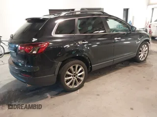 2015 Mazda CX-9 Grand Touring with VIN JM3TB3DV3F0460493, listed as a IAAI auction lot 41053565 with 213,124 mi miles. Bid and sale history available at carsss.com. Image 4.