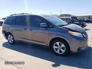 2014 Toyota Sienna LE AAS with VIN 5TDKK3DC2ES425037, listed as a Copart auction lot 50034765 with 193,560 mi miles and Salvage Title. Bid and sale history available at carsss.com. Image 4.