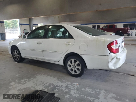 2004 Toyota Camry LE with VIN JTDBE32K940245895, listed as a Copart auction lot 63064585 with 197,467 mi miles and Clean title. Bid and sale history available at DreamBid. Image 2.
