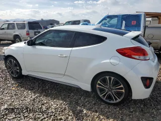 2016 Hyundai Veloster Turbo z VIN KMHTC6AE6GU302201, wystawiony jako Copart lot #54613235 z przebiegiem 105 796 mil mil oraz Szkoda całkowita • Salvage title. Historia ofert i sprzedaży dostępna na DreamBid. Obrazek 2.