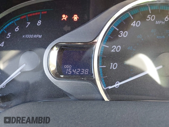 2011 Toyota Sienna XLE AAS with VIN 5TDYK3DCXBS126143, listed as a IAAI auction lot 41663238 with 154,238 mi miles. Bid and sale history available at carsss.com. Image 7.