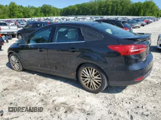 2015 Ford Focus Titanium with VIN 1FADP3J2XFL200489, listed as a Copart auction lot 56443215 with 139,990 mi miles and Clean title. Bid and sale history available at DreamBid. Image 2.