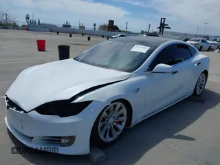 2018 Tesla Model S 75D with VIN 5YJSA1E25JF245269, listed as a IAAI auction lot 41914567 with 56,086 mi miles and . Bid and sale history available at DreamBid. Image 2.