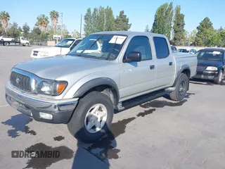 2003 Toyota Tacoma PreRunner z VIN 5TEGN92N63Z152916, wystawiony jako IAAI lot #42153765 z przebiegiem 229 221 mil mil oraz . Historia ofert i sprzedaży dostępna na DreamBid. Obrazek 18.