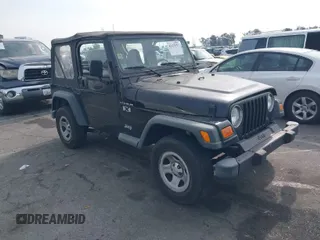 2002 Jeep Wrangler X with VIN 1J4FA39S92P774054, listed as a IAAI auction lot 41470351 with 209,727 mi miles. Bid and sale history available at carsss.com. Image 1.