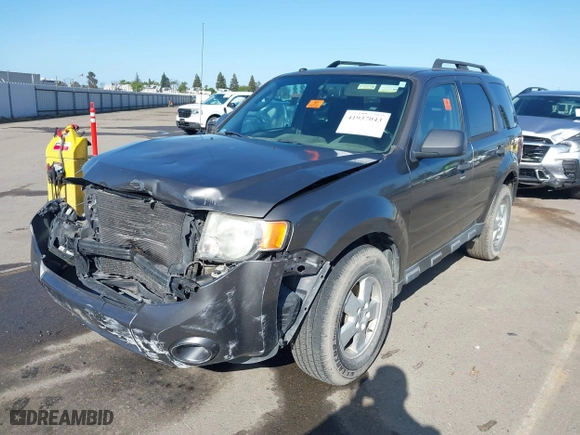 2012 Ford Escape XLT with VIN 1FMCU0D78CKC45514, listed as a IAAI auction lot 41937043 with 162,601 mi miles. Bid and sale history available at carsss.com. Image 2.