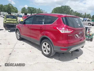 2014 Ford Escape SE with VIN 1FMCU9G92EUA15170, listed as a IAAI auction lot 42456495 with 158,123 mi miles and . Bid and sale history available at DreamBid. Image 3.
