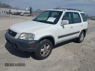 2001 Honda CR-V EX with VIN JHLRD18641C024816, listed as a IAAI auction lot 41811910 with 221,872 mi miles. Bid and sale history available at carsss.com. Image 2.