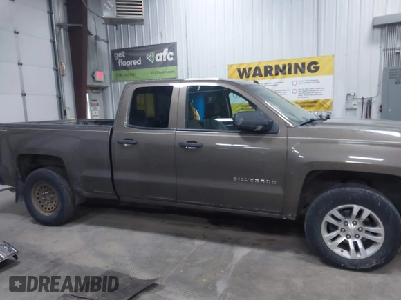 2014 Chevrolet Silverado 1500 LT with VIN 1GCVKREC9EZ240612, listed as a IAAI auction lot 41108566 with 200,625 mi miles and . Bid and sale history available at DreamBid. Image 14.
