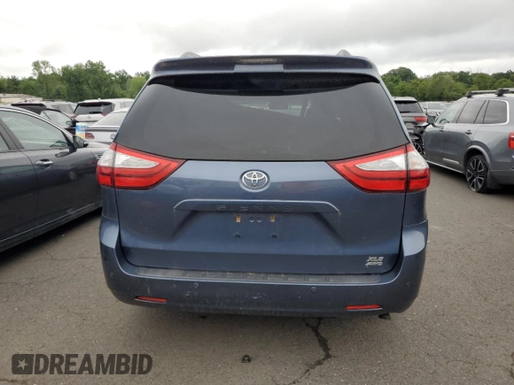 2017 Toyota Sienna XLE with VIN 5TDDZ3DC8HS166630, listed as a Copart auction lot 63404205 with 93,018 mi miles and Salvage title. Bid and sale history available at DreamBid. Image 6.