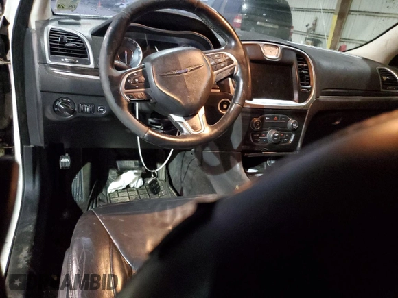 2015 Chrysler 300 Limited with VIN 2C3CCAAG5FH820184, listed as a Copart auction lot 84105134 with 210,459 mi miles and Salvage Title. Bid and sale history available at carsss.com. Image 8.